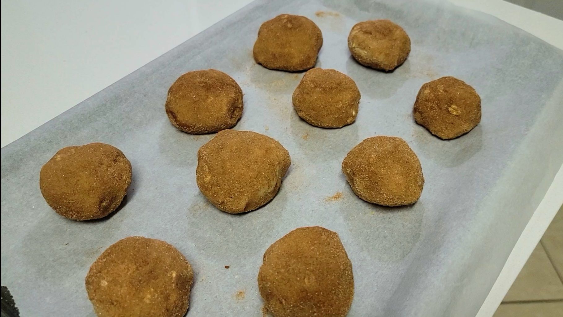snickerdoodle cookies rolled in cinnamon sugar.