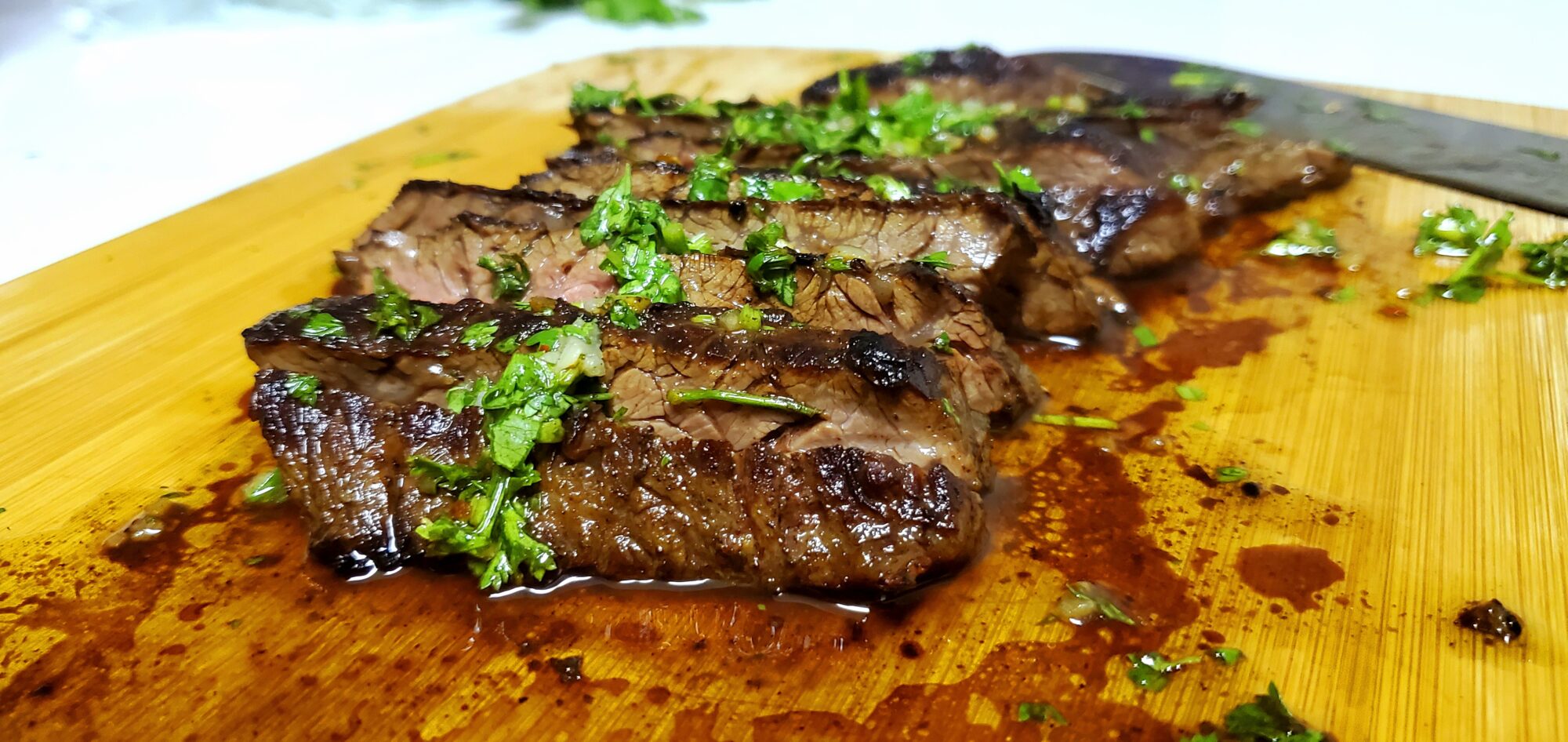 nicaraguan carne asada topped with  fresh chimichurri