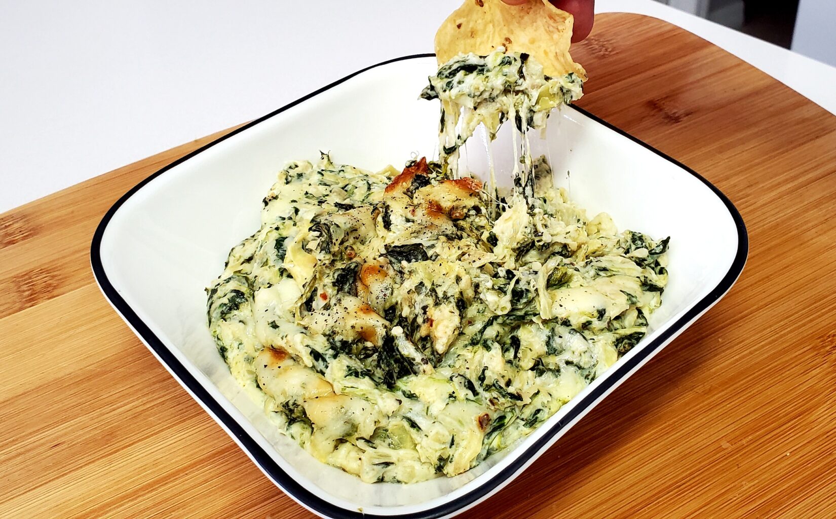 creamy and cheesy spinach artichoke dip for game day and super bowl sunday